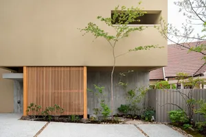 Modern house exterior featuring wooden slats and concrete