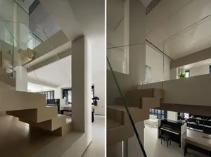 Modern interior design featuring glass and wood elements.