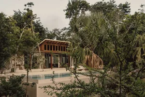 Modern residential exterior featuring wooden materials.