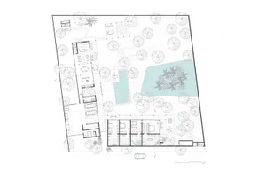 Floor plan of a residential layout with various rooms and outdoor spaces.