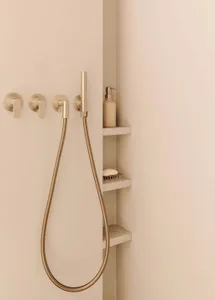 Modern minimalist bathroom featuring concrete showers and a sleek design.
