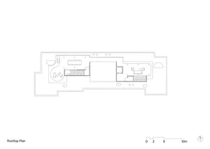 Modern rooftop architectural plan featuring spaces with concrete and glass materials.