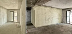 Empty, minimalist commercial interior with cement walls and concrete floor.