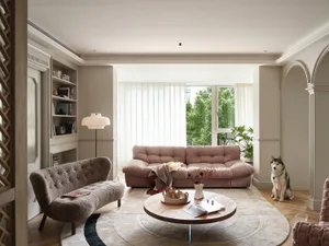 Modern living room with fabric sofa, wooden coffee table, and leather accents.