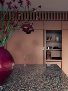 Modern residential kitchen featuring granite countertops, minimalist design, and sleek cabinetry.