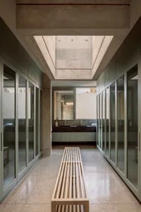 Modern bathroom with concrete and glass elements