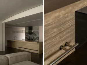 A close-up view of a modern kitchen countertop showcasing the texture and material of the stone.