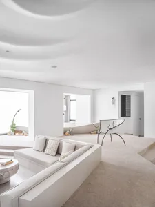 Modern minimalist living room with white furniture and white interior design