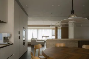 Modern residential interior space with neutral color palette and contemporary design elements.