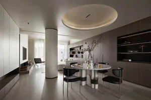 Modern dining room featuring a marble dining table, metal chairs, and wooden accents.
