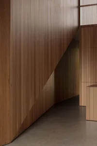 A modern interior space featuring wooden paneling.