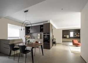 A modern apartment featuring concrete flooring and minimalist design.