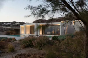 Modern residential architecture with concrete and glass materials.