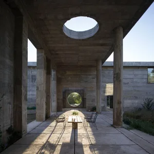 Concrete architectural interior with modern design and open spaces