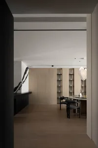 A modern interior featuring wood and marble materials