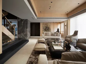 Modern living room with marble accents, featuring contemporary furniture and a cozy atmosphere.