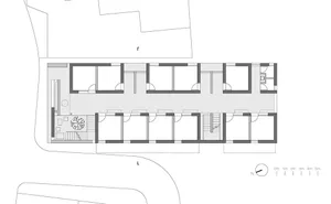 Floor plan of a vertical apartment with concrete flooring.