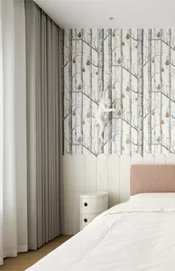 A modern bedroom featuring a white bed with a pink headboard, white curtains, and a wall with a forest wallpaper pattern.
