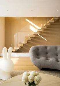 Modern living room featuring wood finishes and minimalist design