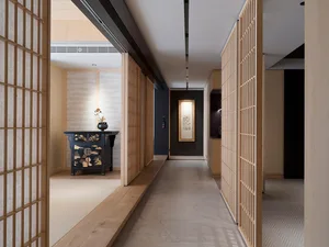 A modern interior design featuring a corridor with wood paneling, minimal lighting, and a calm atmosphere.