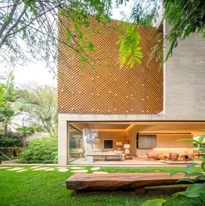 Interior view of a modern living room with a wooden panel wall.