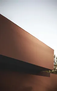 Modern exterior featuring a wall made of concrete