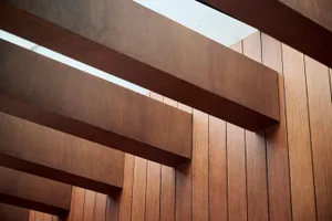 A modern interior design featuring wooden beams.