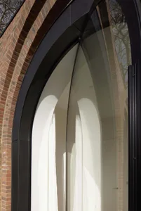 A modern window with a massive glass panel.