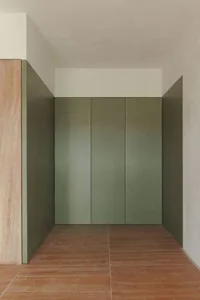 A minimalist interior with metallic walls and a minimalist design.