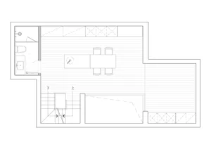 A modern dining room floor plan featuring hardwood flooring and a central dining table.