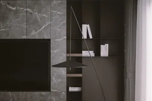 Modern minimalist living room with marble features and black accents.