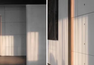 Modern interior design featuring concrete walls and lighting.
