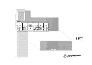 Architectural blueprints of a third-floor plan showing rooms and layout.