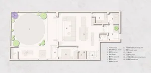 Floor plan of a house shown in white and gray colors on a white background with the layout of rooms and spaces.