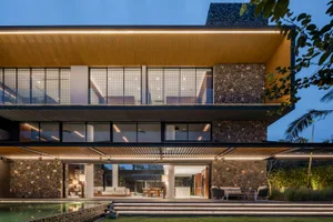 Modern residential home with concrete and wood exterior