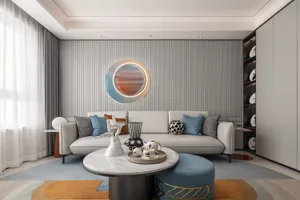 A modern living room featuring a white leather sofa adorned with various cushions and pillows, placed in front of a striped a