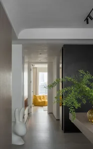 Modern living room with yellow furniture.