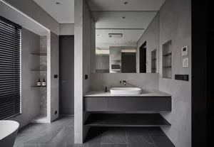 Modern bathroom with a sleek marble countertop and minimalist design.