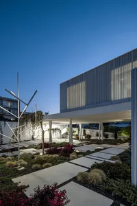 A minimalist architectural exterior with concrete materials and a modern design.