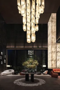Modern lobby featuring elegant metal and glass elements.
