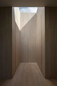 Modern indoor wooden hallway with skylight