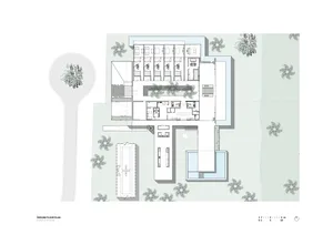 A detailed architectural floor plan of a modern office space on paper.