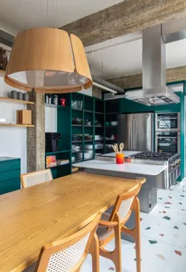 Contemporary kitchen featuring open-plan design, modern materials, and a stunning use of terrazzo.