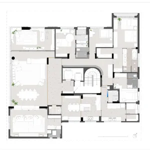 A detailed floor plan of a modern residential building, featuring open spaces and contemporary design elements.