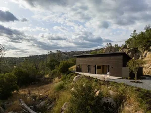 Modern residential home with wooden exterior.