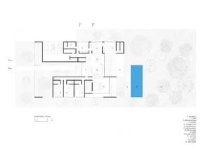 Floor plan of a residential house showing various rooms and features including garage, dining room, kitchen, and bedrooms.