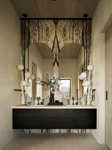 A minimalist bathroom featuring a marble vanity and sink, with a large mirror and spherical lights.
