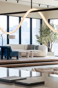 Modern minimalist living room with textured cotton sofa and coffee table.