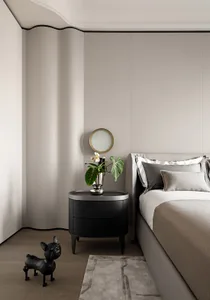 A modern minimalist bedroom with neutral tones, showcasing a sleek bed and smooth textures.