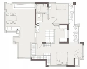 A modern apartment floor plan featuring a living area, dining area, kitchen, and two bedrooms.